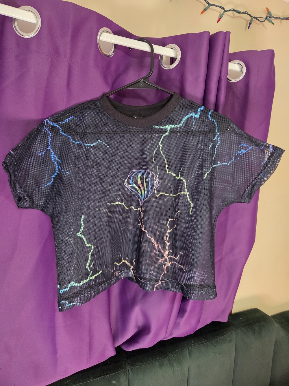 Medium Crop Black Mesh Tee with Multicolor Lightning Graphic & UV Reaction